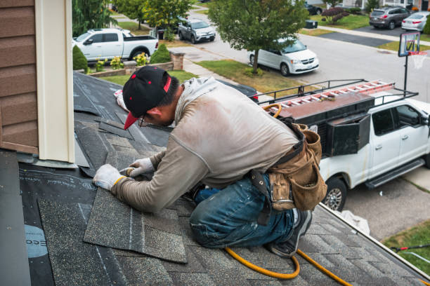 Professional Roofing technician working in Babson Park, MA
